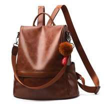 Street trend fur ball ornaments backpack female 2022 new Korean version all-match soft leather large-capacity casual backpack