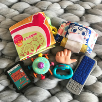 Japan imported people baby creative tooth gum bite glue octopus remote control molar tooth fixer