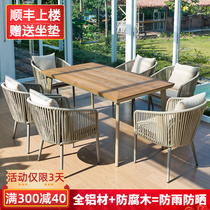 Outdoor table and chairs Courtyard Villa Casual Rattan Chair Terrace Nordic Outdoor Vines Embalming Wood Plastic Wood Tea Table And Chairs Table