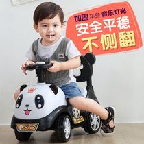 A one-year-old baby rides a car. Children twist a car. New 2021 babies learn to sit on a 1.5-year-old baby.