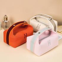 Cosmetic bag womens portable 2021 new ins super fire large capacity portable cosmetics storage bag waterproof toiletry bag