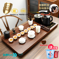 Wujin Stone tea tray set fully automatic one home living room kung fu tea set solid wood tea table Tea Sea