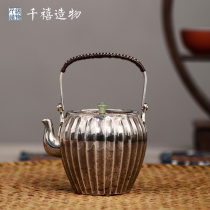 Silver pot 999 sterling silver tea pot foot silver handmade melon petals Retro Japanese kung Fu household boiling water beam small pot