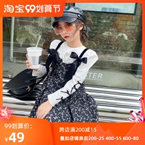 Girl sling floral dress 2021 autumn new middle and big children French sweet puff dress design sense shirt