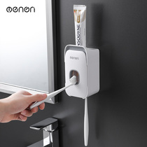 Japan imported MUJI E fully automatic toothpaste wall-mounted non-perforated toothbrush holder lazy extrusion artifact