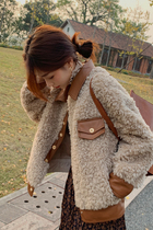 Wool pellet velvet short fur top women 2021 Winter wear new loose fashion Puu leather stitching sheep cut jacket