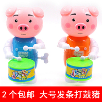  New clockwork drumming seaweed pig drumming winding large cartoon piggy man stall night Market childrens toy gifts
