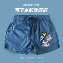 Light and quick-drying loose mens beach swimming trunks lined with three-point pants hot spring anti-embarrassing seaside vacation running sports