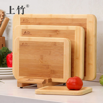 On the bamboo kitchen cutting board household carbonized thickened cutting board large kneading panel combination wooden chopping board set is easy to clean