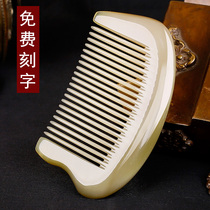 A comb and a picture of natural white yak horns without handles