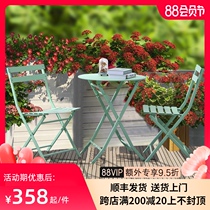 Net celebrity milk tea shop balcony small table and chair Nordic style ins folding chair Simple wrought iron small apartment outdoor combination