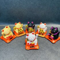 Solar lucky cat car with interior ornaments