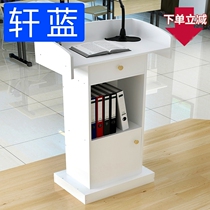 The podium training was conducted in front desk reception stage mobile desk zhu chi tai statement table classes companies