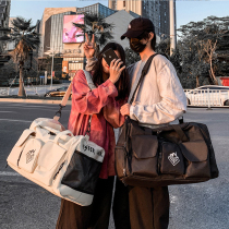 Hong Kong travel bag large-capacity Womens Sports Fitness Bag Mens hand short-distance travel travel luggage storage bag