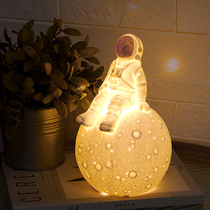 ins table lamp Bedside lamp Boys night lamp Personality bedroom living room decoration lamp Nordic simple ceramic astronaut lamp
