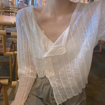 Summer irregular short thin sunscreen blouse womens outer openwork micro-transparent Foreign style light ice silk knitted cardigan