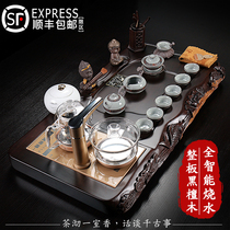 Whole board ebony tea tray Ceramic Purple sand Kung Fu tea set Chinese lotus fish carving automatic electrical household