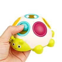 The baby is very busy the baby is holding and pressing to explore the toy. 6-12 months the flexible finger exercise ability is 1-2 years old.