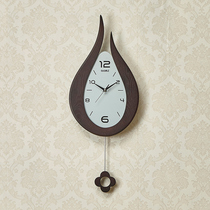 Ao Meisi modern simple living room creative wall clock Nordic mute atmosphere European style Chinese style fashion quartz pendulum clock