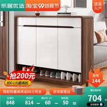 It is a shoe cabinet and a large capacity walnut solid wood color outside the door of the door.