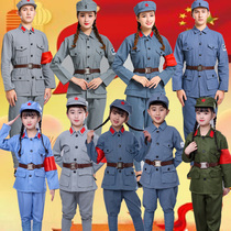 Red uniformed adult Red Army acting out the men and women of the 8th Lutheran Army War of Resistance against the Red Guards Childrens Little Red Army Performance