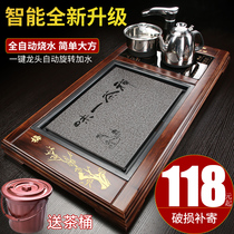 Fully automatic household simple imitation Wujin Stone tea table electric heating magnetic stove tray solid wood office integrated tea tray