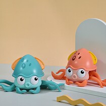 The walking octopus toy trembles the small octopus makes the girlfriend happy the amphibious sand sculpture plays in the water