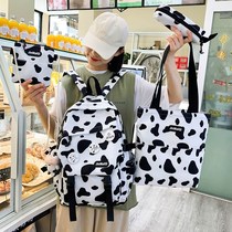 Schoolbag female light Primary School students cute milk cow pattern three to five or six grade high capacity junior high school students backpack backpack