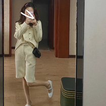 Irregular design sense small fragrance jacket shorts set 2021 early autumn new fashionable socialite wind Joker age age reduction tide