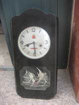 Old wall clock era features black lacquered wooden shell Peacock brand can use old mechanical wall clock intact tropical fish