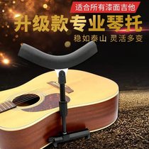 Strut guitars matte shellac lacquer Murata folk classical ukulele pedal strap corrective posture