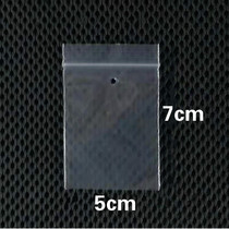 There are perforated self-sealing plastic small bags clothing button accessories 5*7 spot sealed storage mini packaging