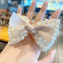 European and American small fragrant wind butterfly knot brief imitation pearl hair ring woman hair rope pellet head rope fashion and delicate trend hair decoration
