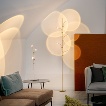  Light and shadow atmosphere floor lamp ins wind minimalist designer art living room projection lamp Creative Nordic light luxury table lamp