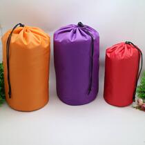 Cylindrical nylon bundle pocket down jacket storage bag travel organization bag drawstring bag spot can be customized LOGO