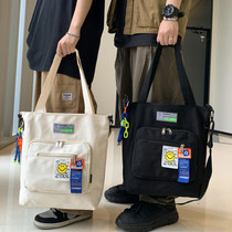 Summer men and women Hand bag Japanese Joker students large capacity canvas shoulder bag Korean leisure class shoulder bag
