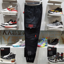 Li Ning Casual Pants Man 2021 Spring New Fashion Day Into The Bucket Gold Pure Cotton Closing Tooling Sports Pants AKXRS005
