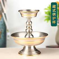 The Cup for the Protector imitates the Pure Copper Tibetan Style Of Nepal Eight Auspicious Light-Faced Tantric Buddhas in front of the offering ornaments of the Holy Water Cup in front of the Buddha