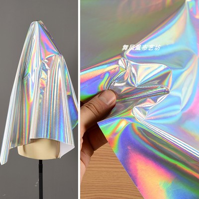 taobao agent Bright silver -colored laser phantom mirror leather fabric colorful, colorful, colorful change patent leather reflector light imitation leather cloth