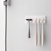 Toothbrush rack wall-mounted non-perforated simple Japanese creative toilet electric toothbrush holder light luxury bathroom artifact