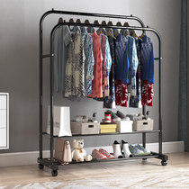 Temporary clothes on the side of the bed. The bedroom will take off the clothes. The bedroom will temporarily put clothes. Jeans for storage.