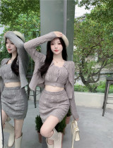Urban sexy beauty spice girl wearing a twist white knitted cardigan jacket female senior feeling autumn and winter sweater bag hip