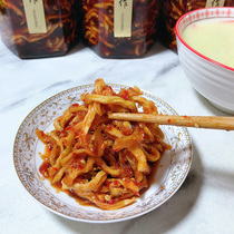 Papaya silk dry sauce with spicy traditional homemade ready-to-eat with slightly spicy papaya strips wood