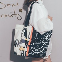 Large capacity canvas bag female 2021 New Korean version of Harajuku Joker graffiti shoulder bag student class tote bag