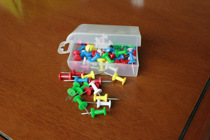 A box of 50 colored pushpins