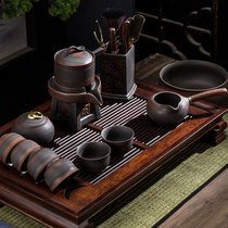 Anti-hot purple pottery automatic tea set home retro kung fu tea cup stone grinding lazy Chinese tea maker ceramics