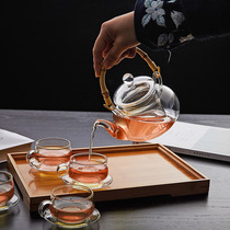 High temperature resistant glass tea set set household simple transparent thick bubble teapot bamboo lifting beam pot whole set of flowers and grass tea set