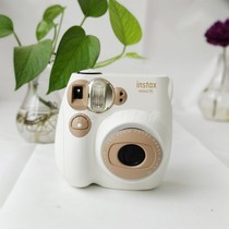 The new Fuji market camera mini7c mini 7 is a photo selfie camera paper