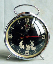 (Antique)White pigeon brand ink plate rabbit pull car (rabbit head will move)mechanical alarm clock