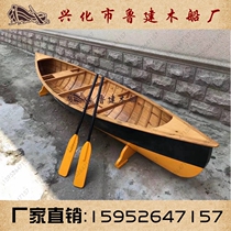 Wooden boat fishing boat solid wood round bottom European boat log color landscape boat decoration photography props boat stage school